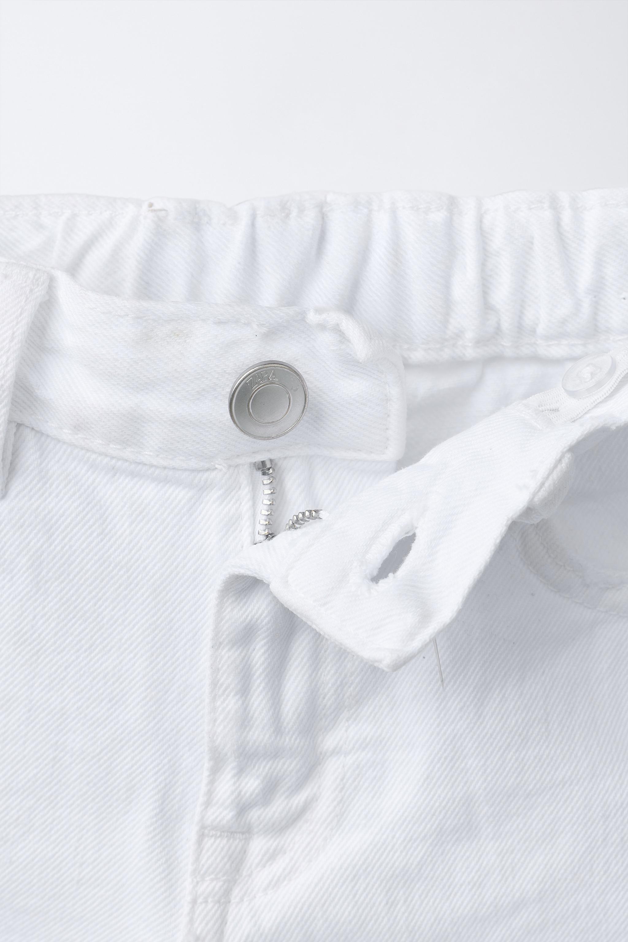 BERMUDA EN DENIM DÉCHIRÉ